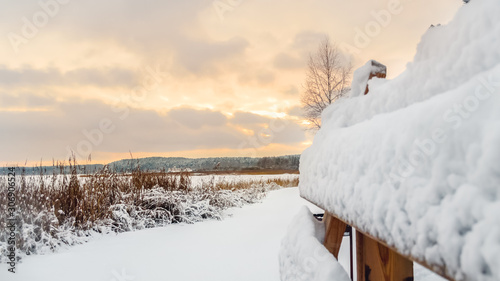 winter landscape with snow and white fence