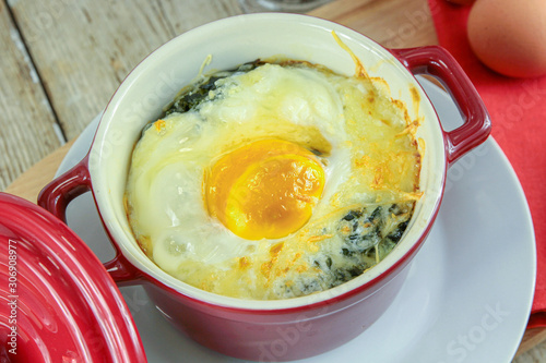 Slika na platnu Florentine egg in a casserole