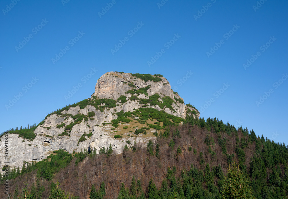 Maly Rozsutec, Mala Fatra, Slovakia - top of the rocky mountains. Rocks, trees, forest and clear blue sky