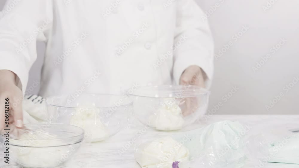Step by step. Mixing food coloring with buttercream frosting. Step by step. Mixing food coloring with buttercream frosting.