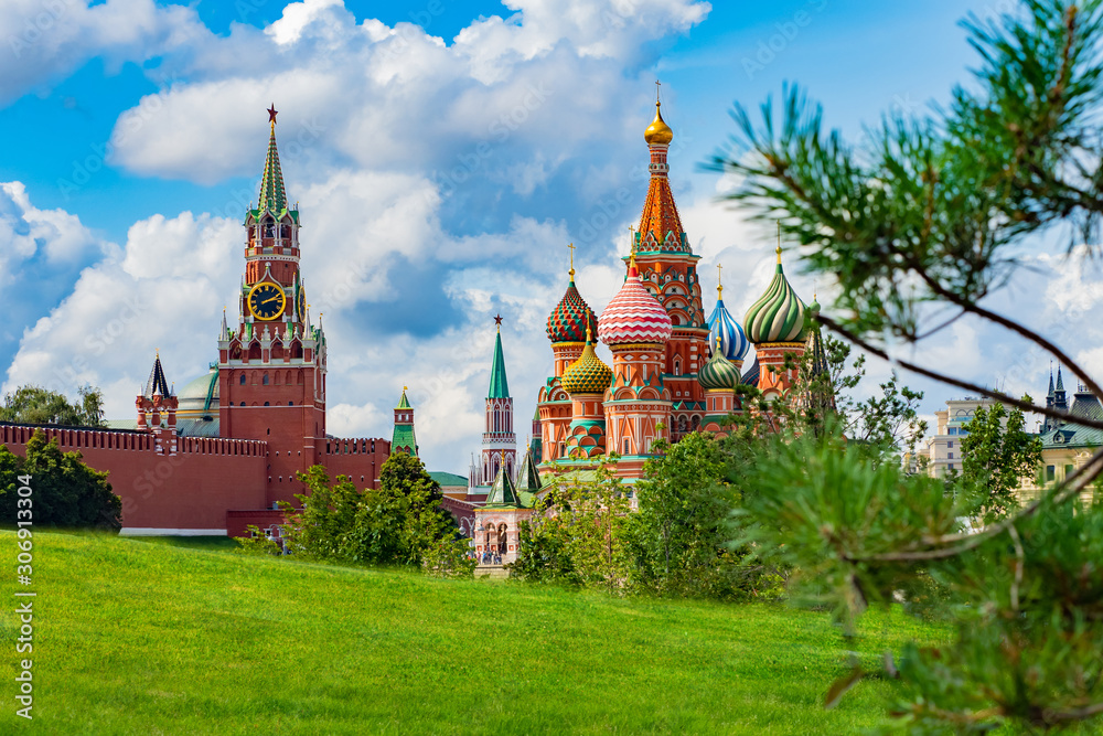 Moscow. Russia. View of the Kremlin. Spasskaya tower of the Kremlin. St. Basil's Cathedral. Symbols of the Russian state. The center of the capital of Russia. Summer trip to Moscow.