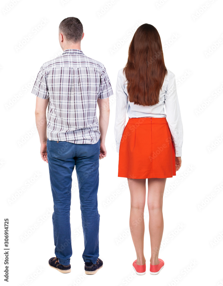 Back view of couple. beautiful friendly girl and guy together. Back view of couple. beautiful friendly girl and guy together.