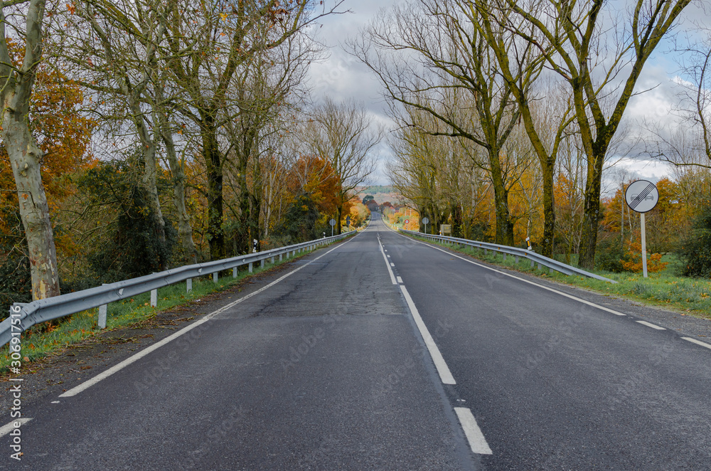 Fototapeta premium Straight section of a national road in Galicia, Spain.