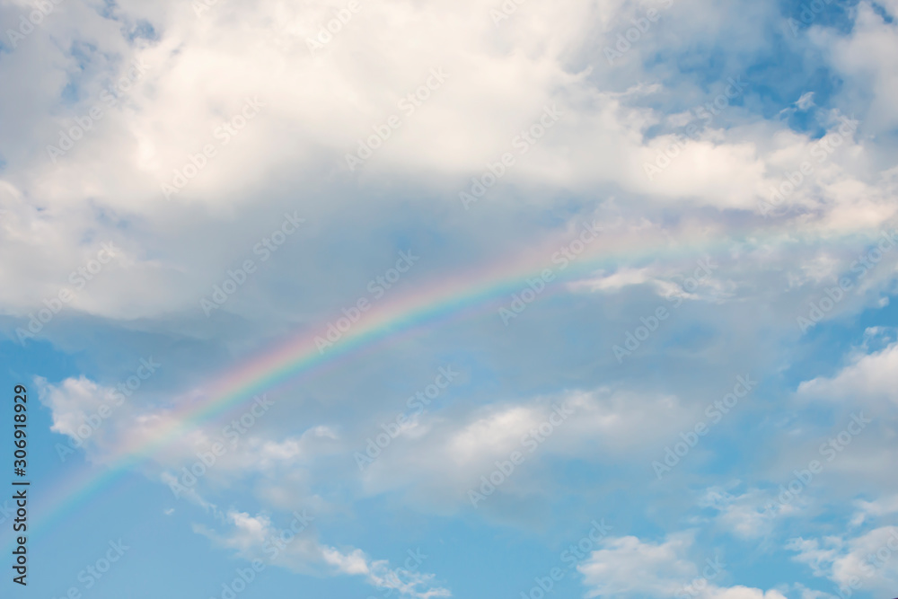 The clear rainbow in the sky.