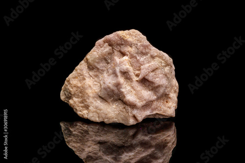 macro mineral stone Hackmanite on a black background