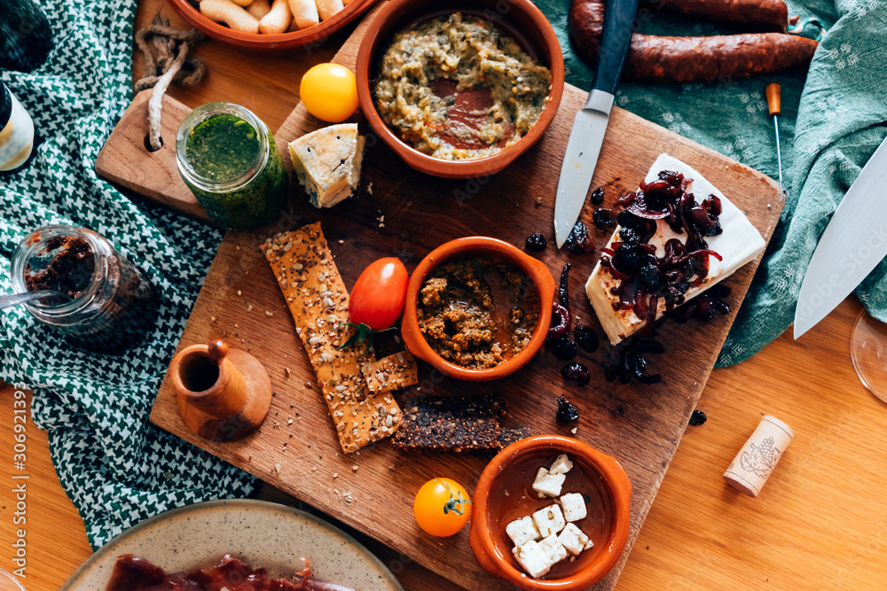 high angle view of tapas food disposed on a wooden table