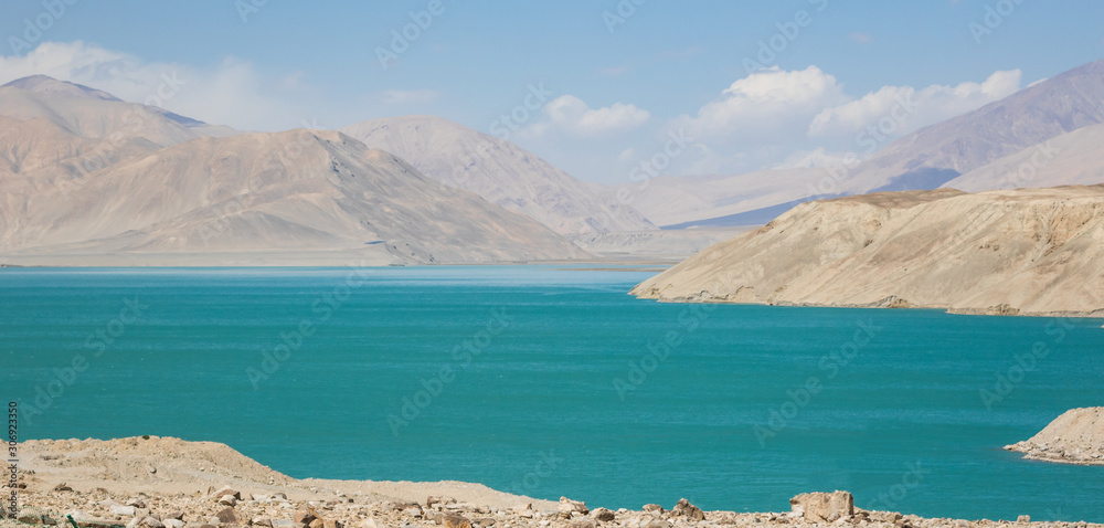 Tashkurgan, China - located 3.500m above the sea level, along the road between Kashgar and Tashkurgan, the Baisha Lake offers some amazing sights and colors 