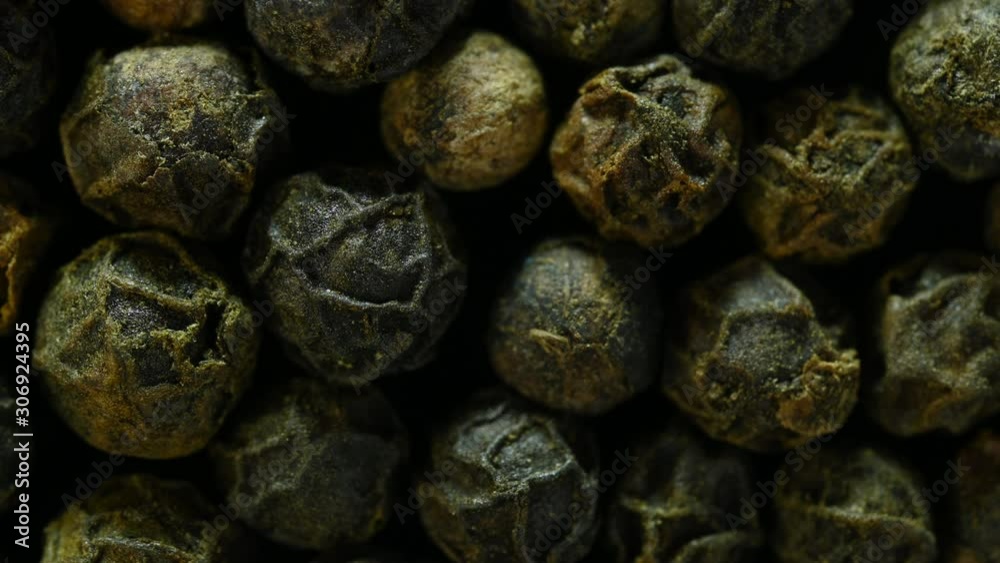 black pepper spins on table top view 
