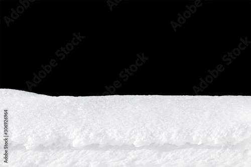 layer of fresh snow on a black background © kobzev3179