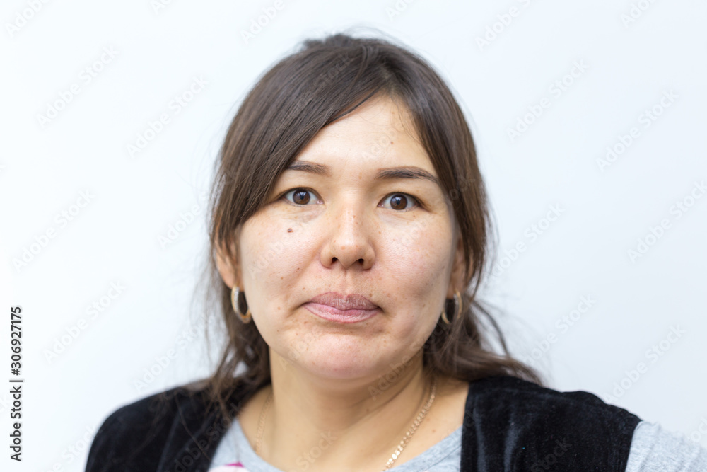 Young happy girl have some fun. Smiling woman without makeup. White background is not isolated Young happy girl have some fun. Smiling woman without makeup. White background is not isolated