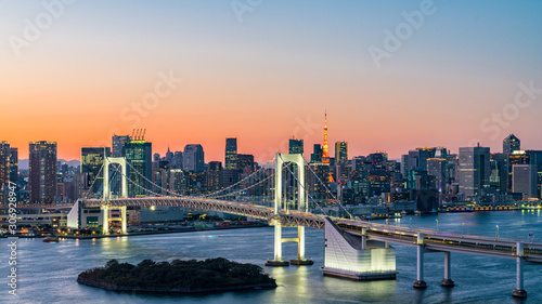 Fototapeta Naklejka Na Ścianę i Meble -  Panorama beautiful view of Rainbow Bridge, Tokyo Tower and tokyo downtown skyline in evening pastel sky and twilight scene with cityscape at Odaiba Japan.