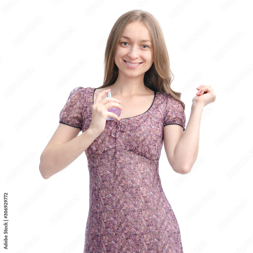 Woman in floral print dress with perfume beauty on white background isolation Woman in floral print dress with perfume beauty on white background isolation