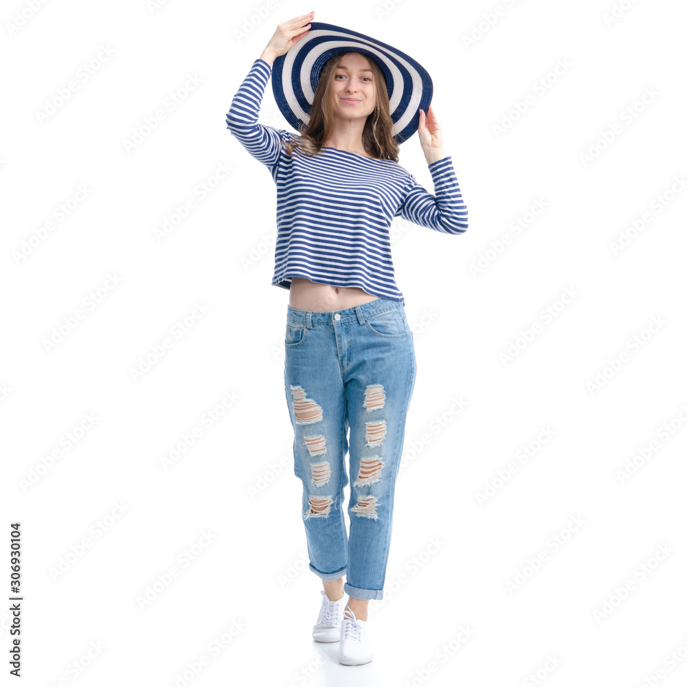 Woman in jeans and vest with sunhat smile goes walking on white background isolation Woman in jeans and vest with sunhat smile goes walking on white background isolation