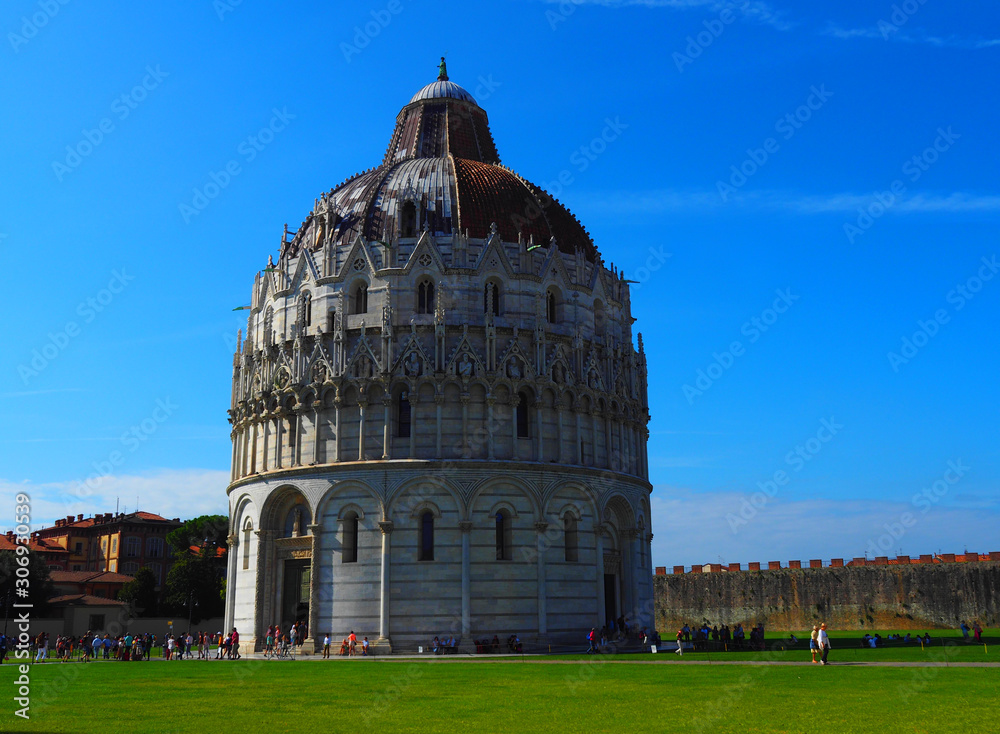 View of the Pisa Baptistery of St. John (Battistero di San Giovanni) in Pisa, Italy. It is located in Miracoli Square (Piazza dei Miracoli).