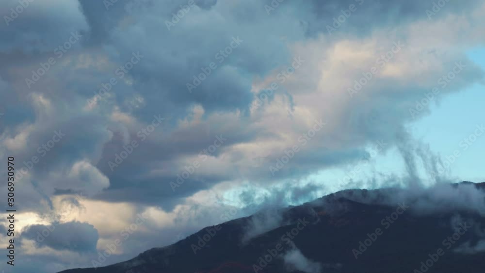 Time lapse clouds move over trees highland forest. Foggy morning landscape. Time lapse clouds move over trees highland forest. Foggy morning landscape.