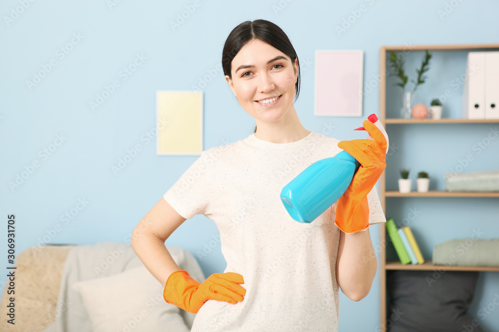 Young housewife is doing house cleaning. Young housewife is doing house cleaning.