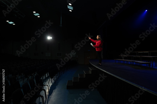 Teenagers rehearsing in a theatre photo