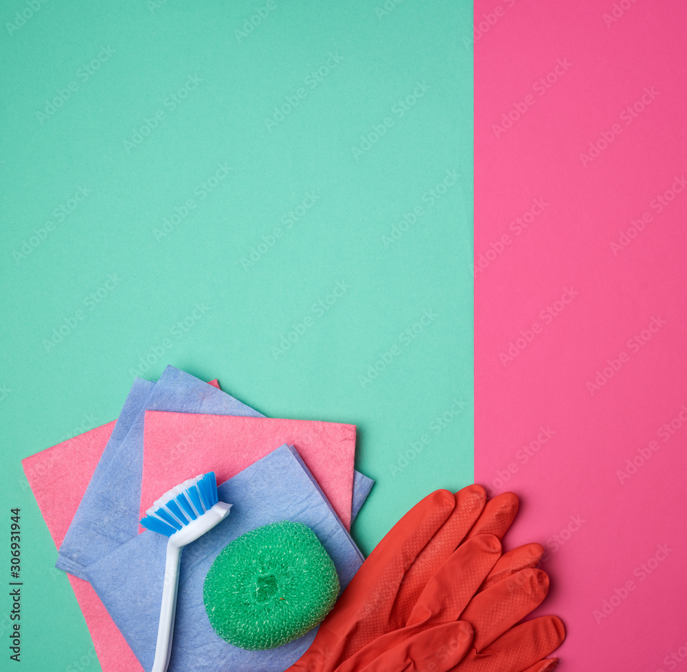 items for home cleaning: red rubber gloves, brush, multi-colored sponges for dusting items for home cleaning: red rubber gloves, brush, multi-colored sponges for dusting