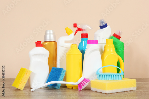 set of cleaning products on the table on a colored background.