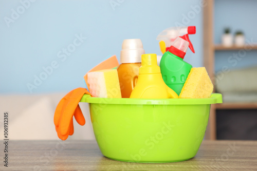 cleaning products on the table in the interior of the room.