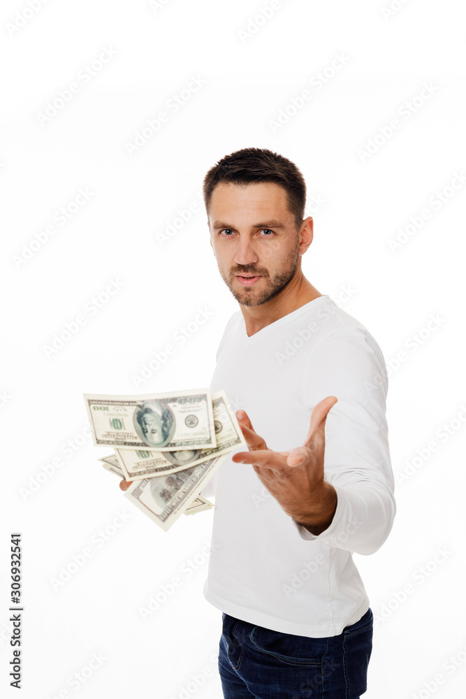 Portrait of young businessman throwing out money banknotes isolated on white background Portrait of young businessman throwing out money banknotes isolated on white background