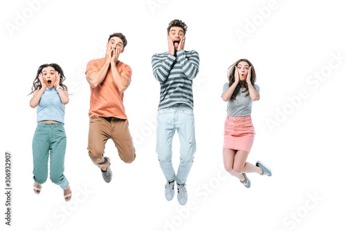 excited friends screaming and jumping, isolated on white