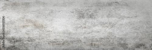 Scratched grunge texture with old,dusty and dirty surface.Vintage retro background.Long panoramic horizontal format. 