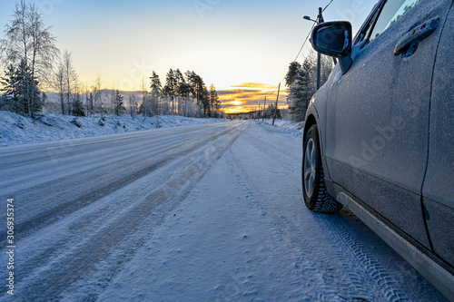 car parked near icy road in Varmland Sweden © Jonas