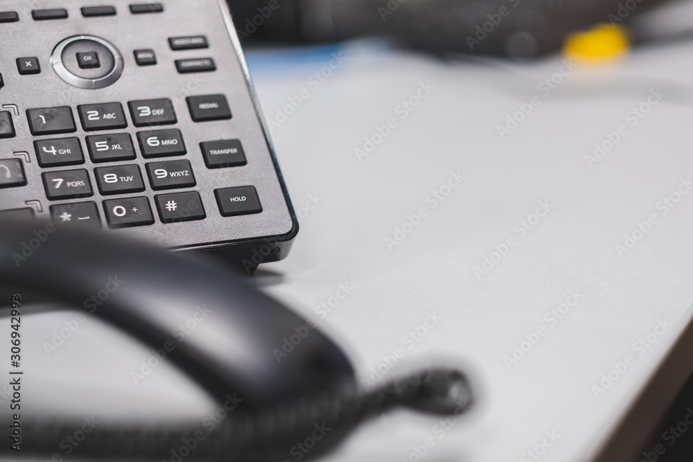 Close up keypad number ip phone devices at office desk,Cocept business work. Close up keypad number ip phone devices at office desk,Cocept business work.