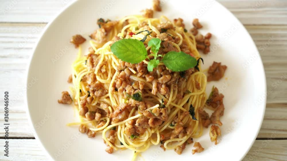 stir-fried spicy spaghetti with minced pork and basil