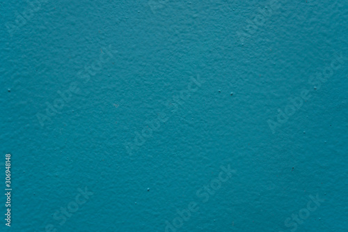 Turquoise color background. Texture of painted wall. Background or texture with place  space for text.