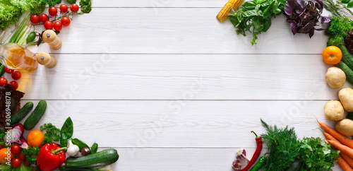 Frame of fresh organic vegetables with spices and oil photo
