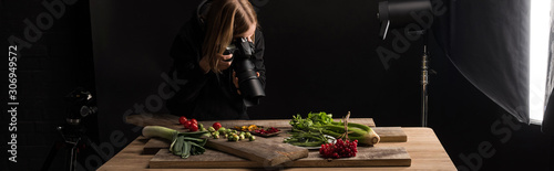 professional photographer making food composition for commercial photography and taking photo on digital camera , panoramic shot photo