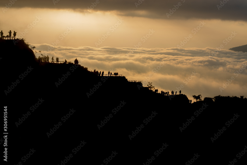 Fototapeta premium Scenic view of clouds and mist at sunrise