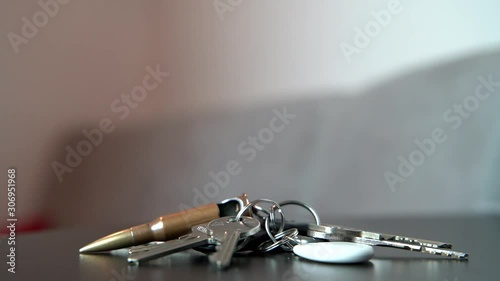 Placing bunch of keys on table