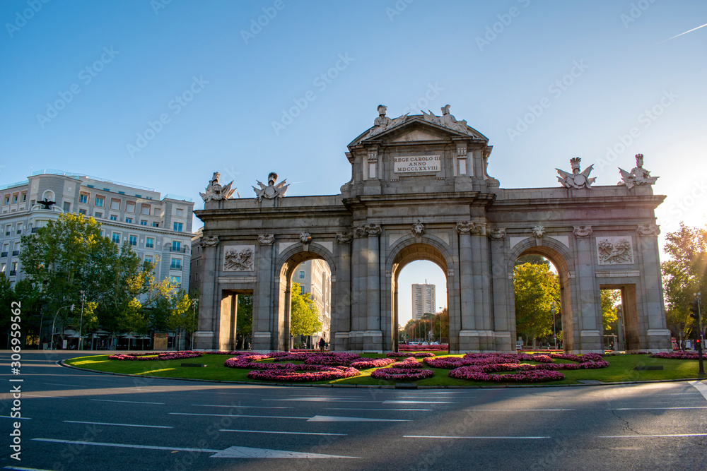 Puerta de Alcalá in Madrid with bright colors and without cars.