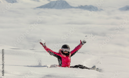 Skiing girl enjoying winter vacation.