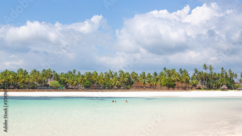 Fototapeta Naklejka Na Ścianę i Meble -  people swim in the sea at diani beach in kenia