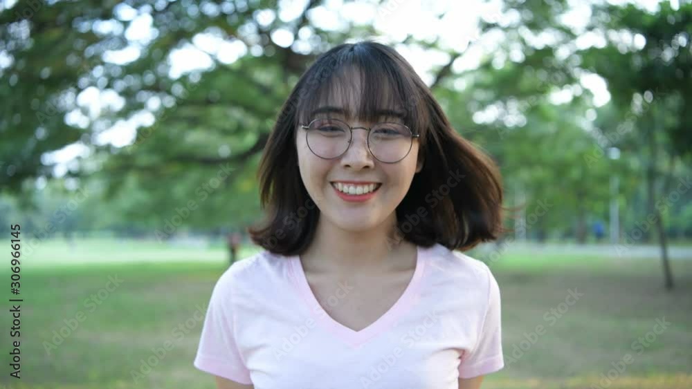Holiday concept. The girl looked at the camera and smiled happily. 4k Resolution. Holiday concept. The girl looked at the camera and smiled happily. 4k Resolution.