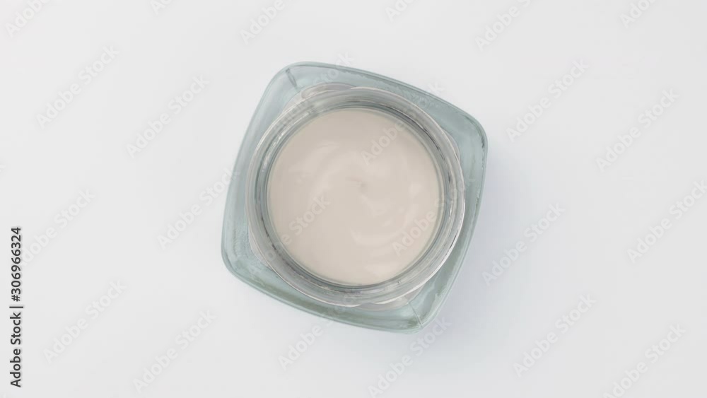 Closeup shot of cosmetics cream with rotate, Top view Closeup shot of cosmetics cream with rotate, Top view