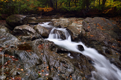 West Branch of the Waterbury River in the rain above Bingham Falls Stowe Vermont photo