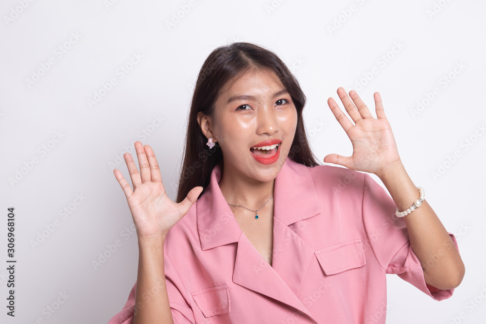 Young Asian woman sticking her tongue out. Young Asian woman sticking her tongue out.