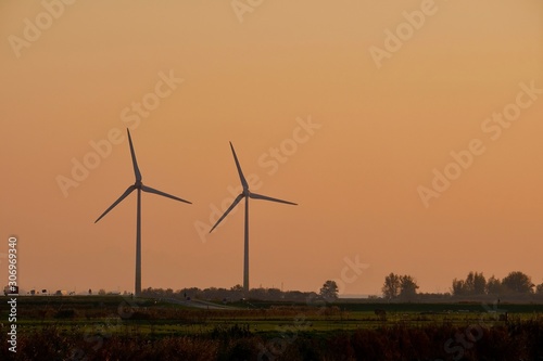 wind turbines at sunset