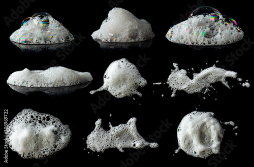 Set of soap foam Shaving cream bubble isolated on black background photo