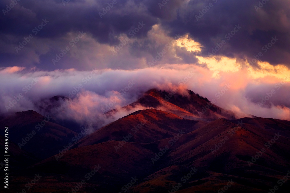 Mountain Wilderness with Clouds and Sunset Light Mountain Wilderness with Clouds and Sunset Light