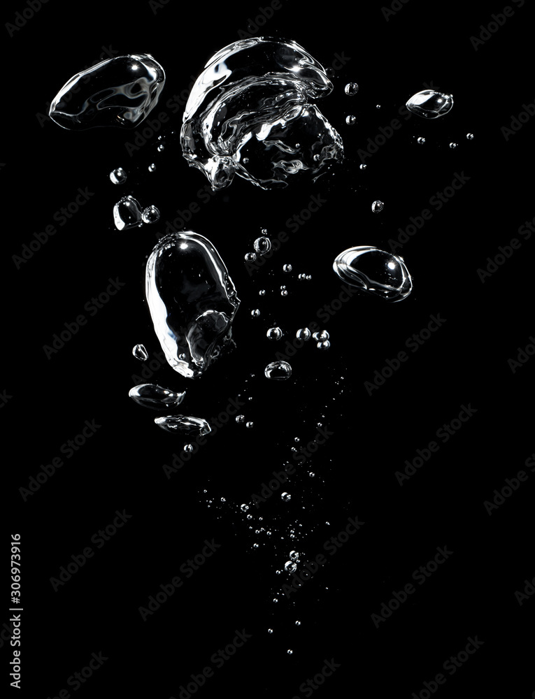 Air bubbles in the water on black background. Stock Photo | Adobe Stock