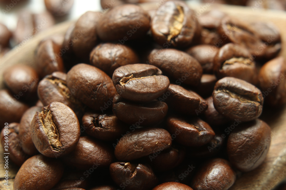 Coffee beans on macro shooting, closer view on a coffee beans. Coffee beans on macro shooting, closer view on a coffee beans.