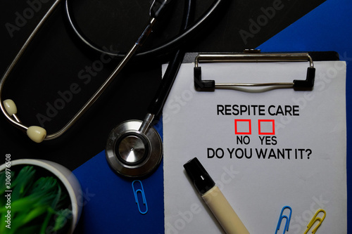Respite Care, Do You Want it? Yes or No. On office desk background