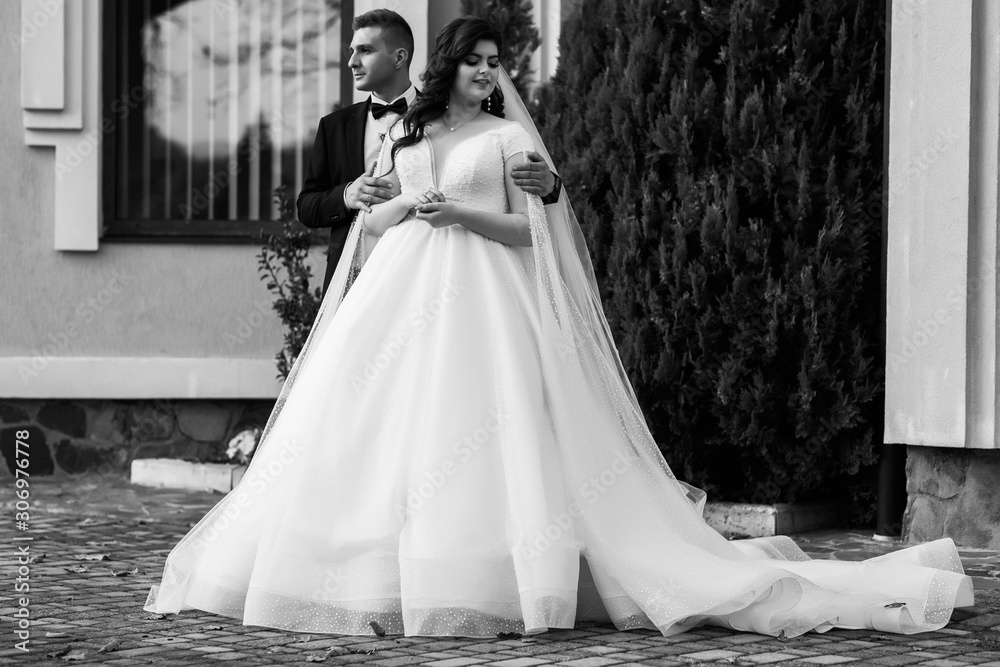 Couple In Love. Romantic and love. Just married loving couple in wedding dress and suit in autumn. Bride and groom having a romantic moments on their wedding day. Sensual couple kiss. I Love You. Couple In Love. Romantic and love. Just married loving couple in wedding dress and suit in autumn. Bride and groom having a romantic moments on their wedding day. Sensual couple kiss. I Love You.