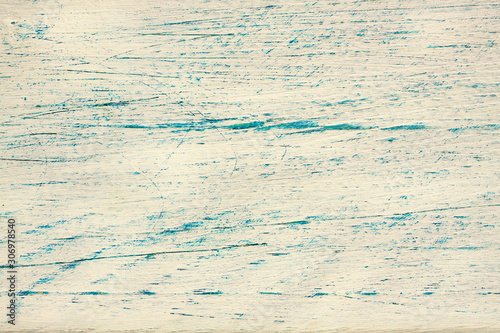 Vintage texture of a wooden surface. Background of an old ivory board. Retro rustics grunge wood texture with blue paint. 